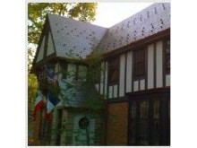 1922 Tudor Roof Restoration. Newly installed Vermont slate roof with 20 x 14 slate.